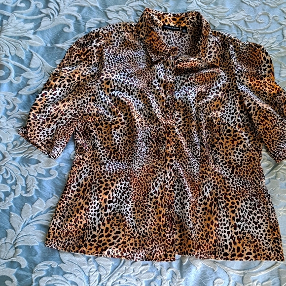 Essential by Milano Tops - A beautiful Milano leopard blouse.